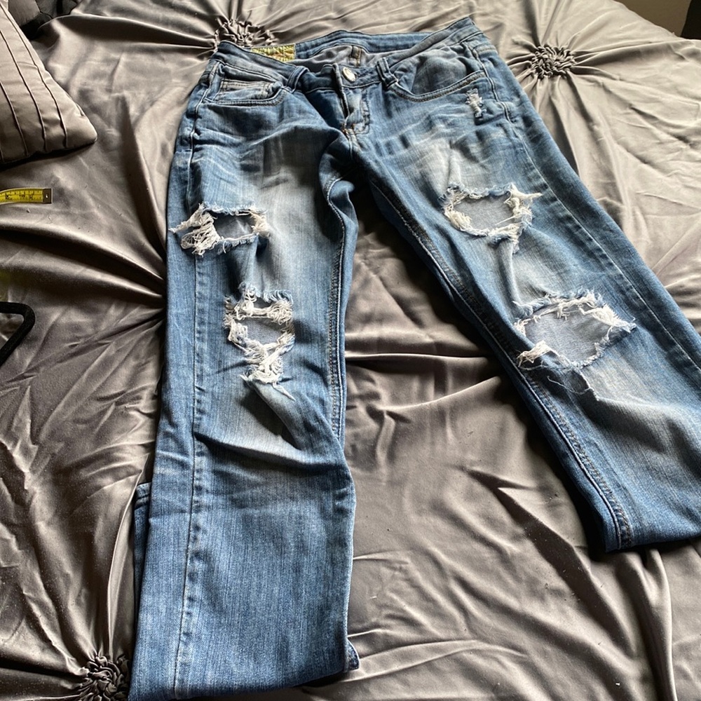 Distressed denim by Machine Jeans